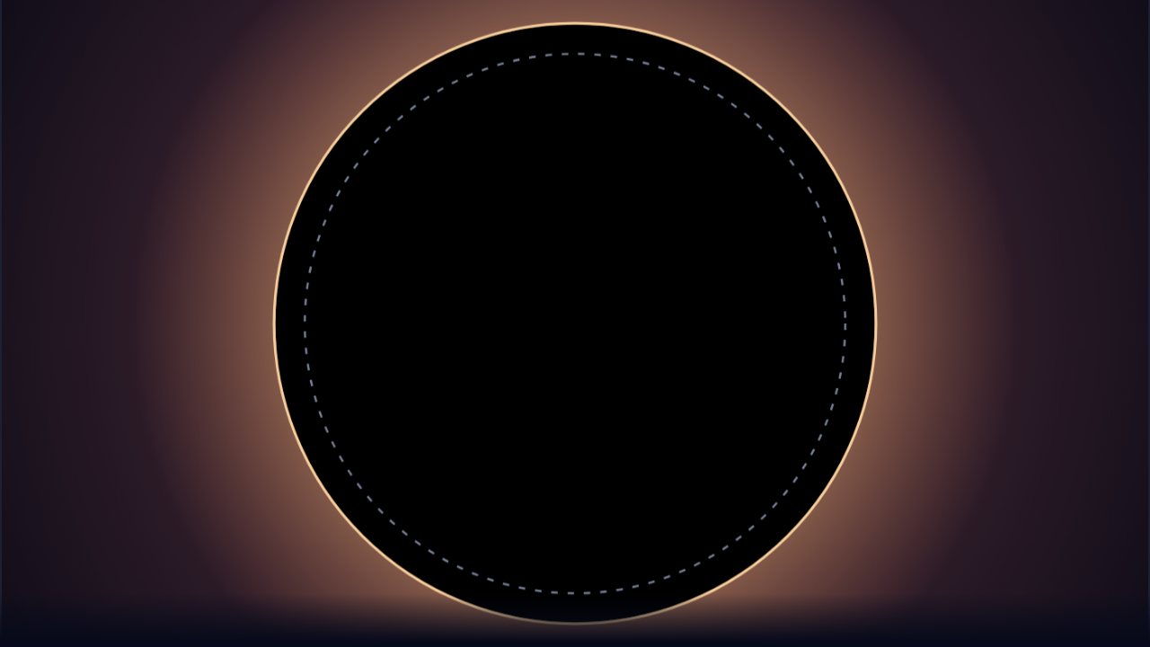 A black hole drawn as a black disc with a glowing rim inside a dashed comparison ring